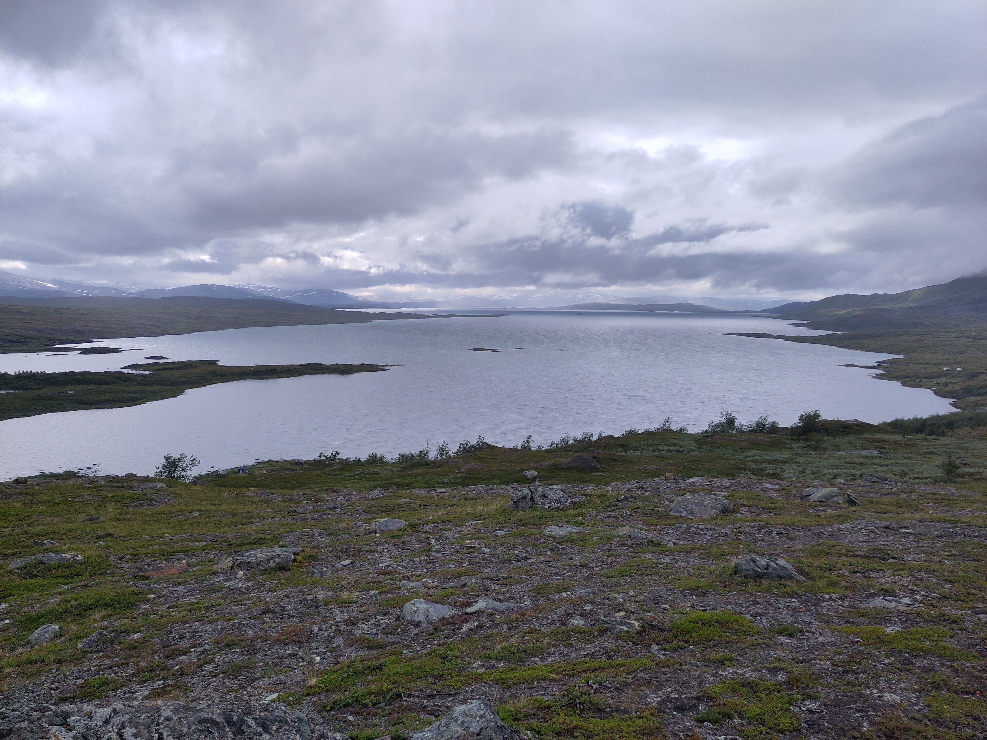 Another large lake, this time less wide from left to right in the photo, but the further shore is very far away.